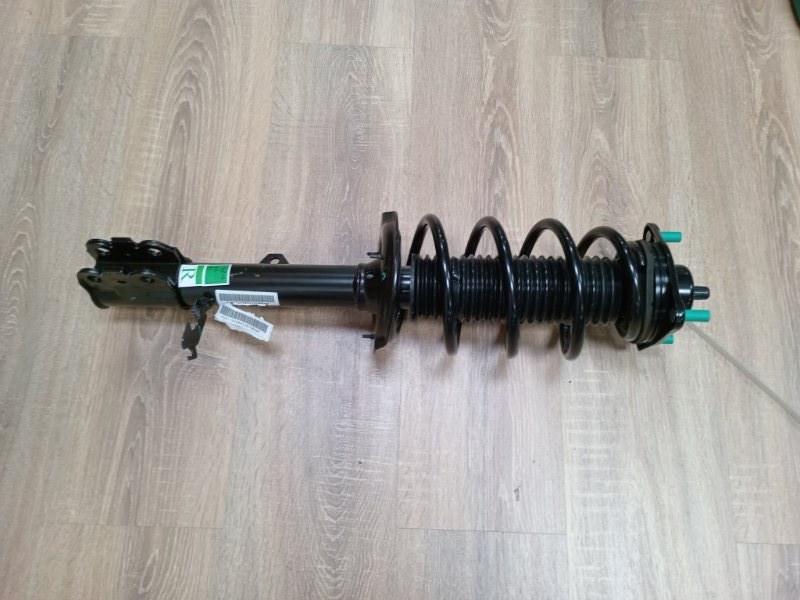 Амортизатор передний правый в сборе