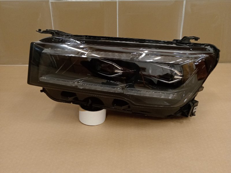 Фара ксеноновая передняя левая Geely Monjaro